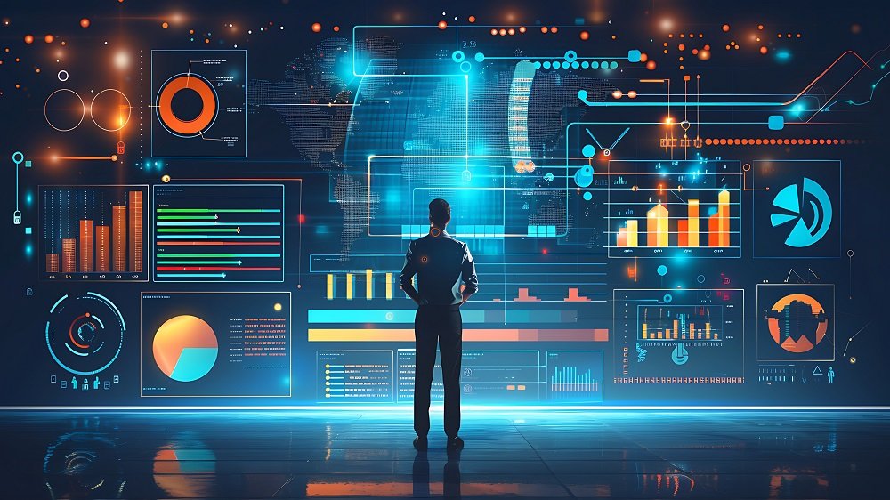 man-stands-front-screen-with-words-graph-it